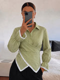 Green wrap blouse with ruffle sleeve trim